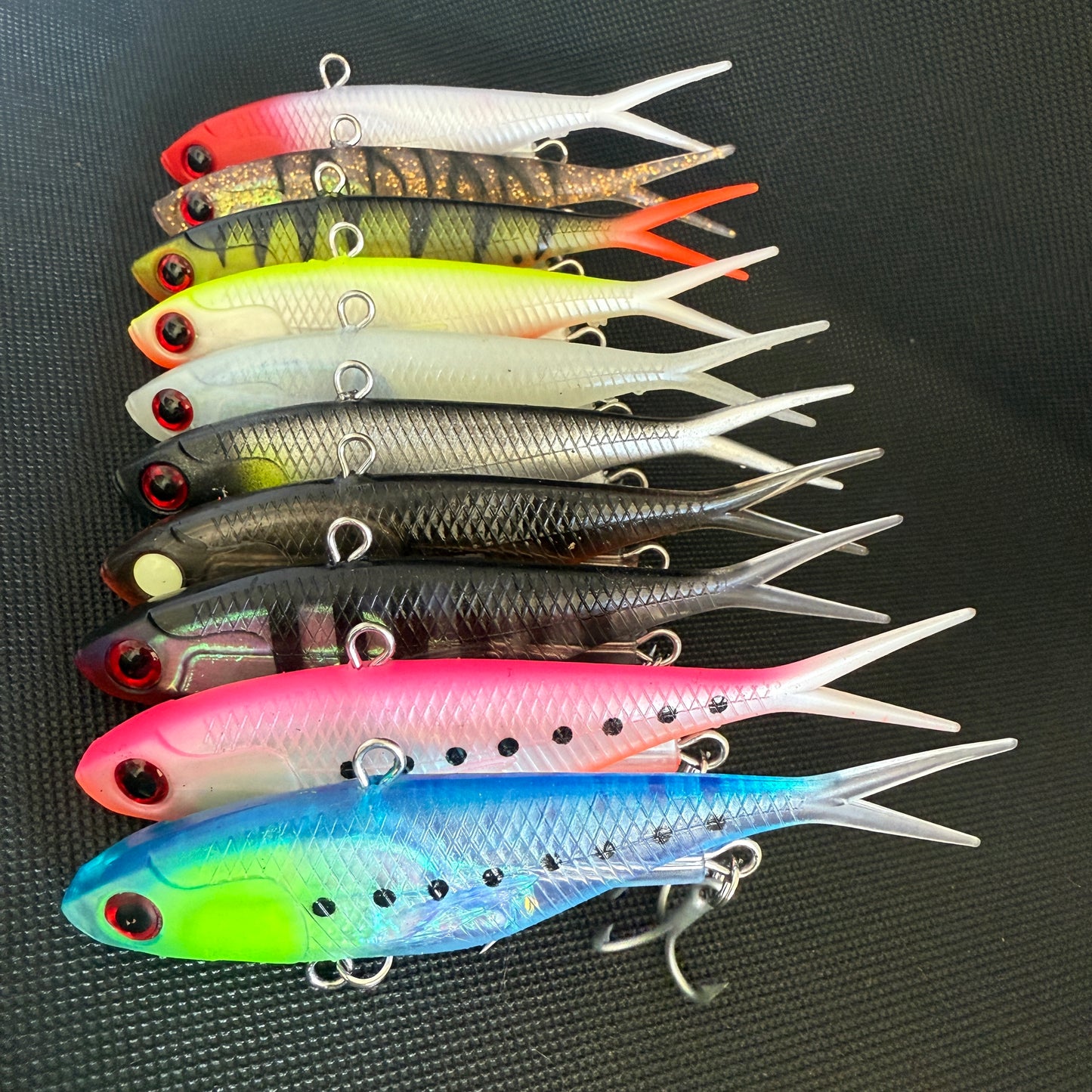 Neon green, yellow, and striped 115mm 45g Weapon Box fishing lures – built for deep water and tough fish