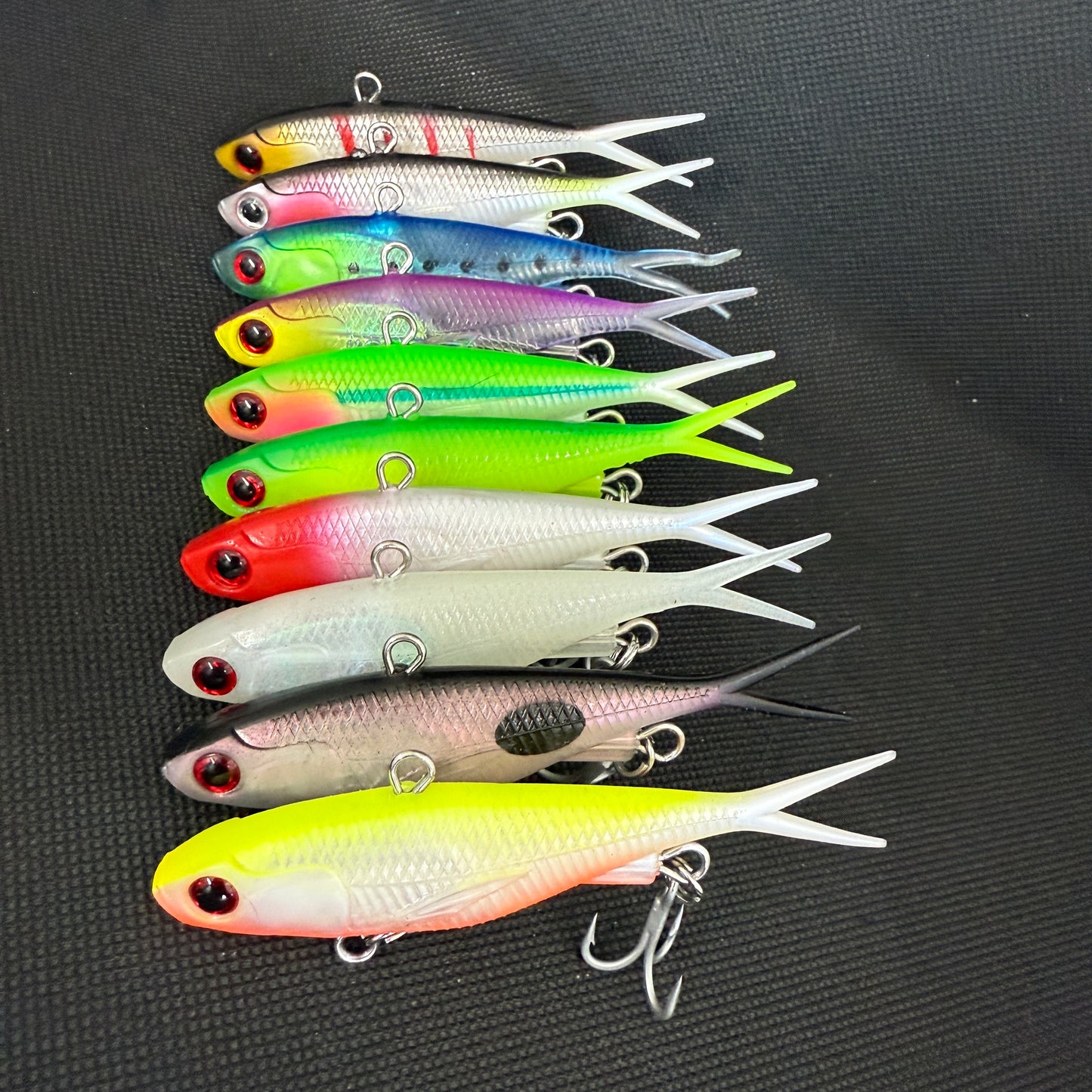 Bulk 20-Pack of Reel Action 95mm / 26g vibes in assorted colours, rigged with trebles.
