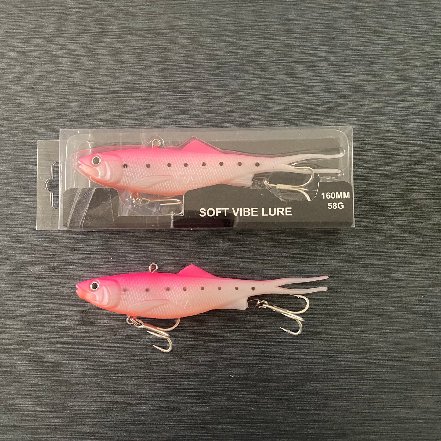 Packaged 160mm Yaas Gabs pink and white vibe fishing lure with black spots