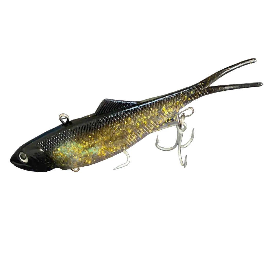 Close-up of Reel Action 160mm Black & Gold Vibe fishing lure with soft plastic tail and BKK trebles.
