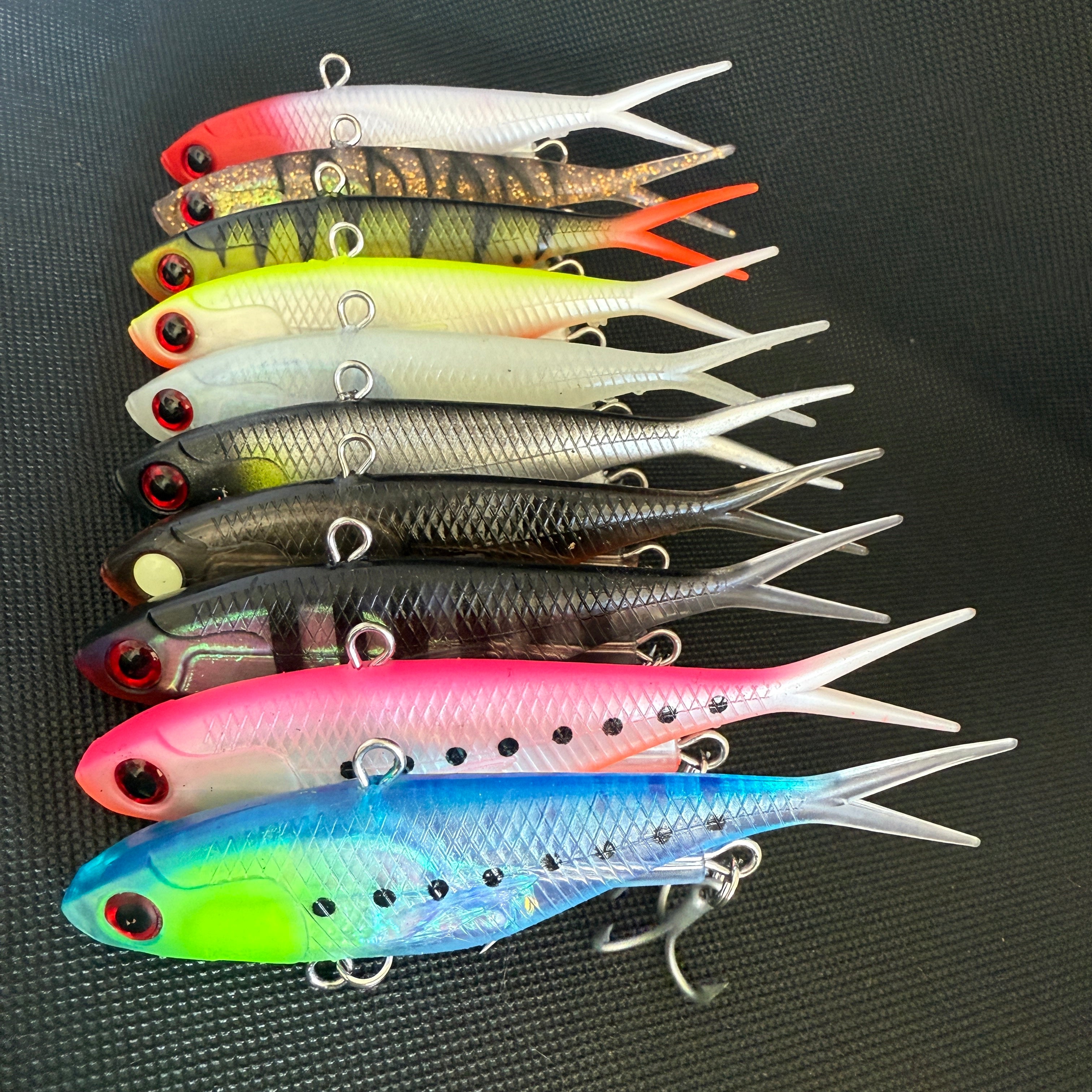 Neon green, yellow, and striped 115mm 45g Weapon Box fishing lures – built for deep water and tough fish